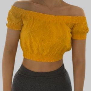 Yellow crop top in size small.